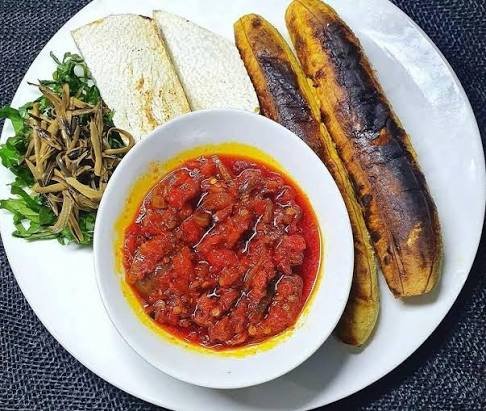 Roasted Yam or Plantain with local sauce (Bole) with Ugba